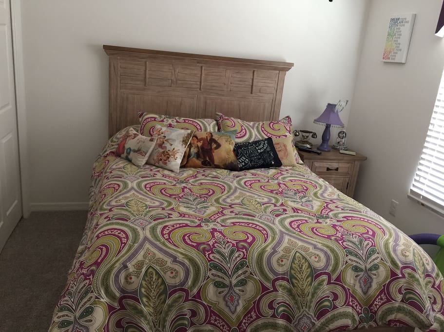 Guest bedroom with comfortable queen size bed
