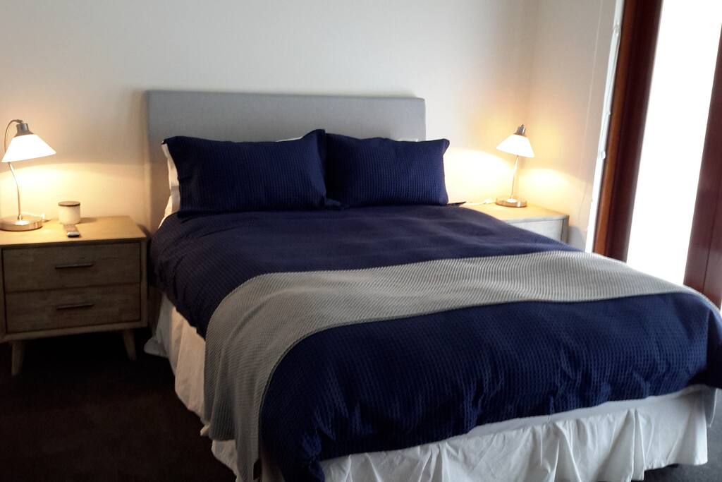 Main bedroom at from of house - Queen bed