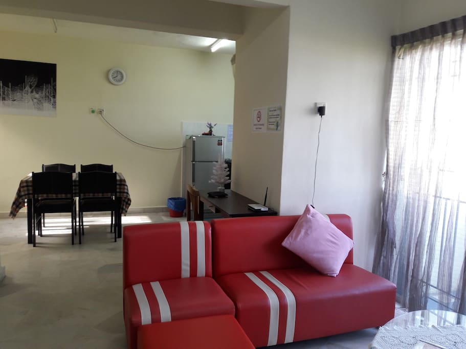 Living Room Sofa and view of the dining area