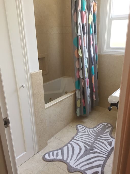 Guest bath with jacuzzi tub.
