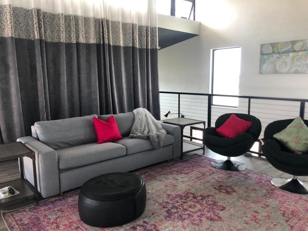 Mezzanine TV/ Queen extra bedroom,  very comfortable memory foam sleeper sofa. Long luxurious drapes to close off for private bedroom conversion.