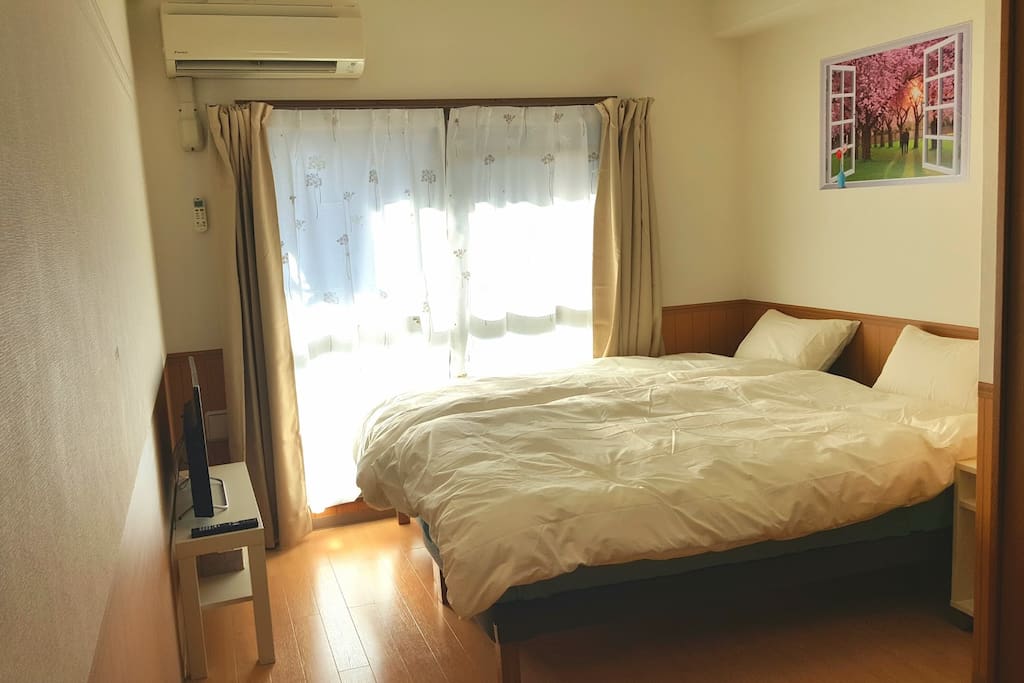 Comfortable two single bed combined together and become a double bed.