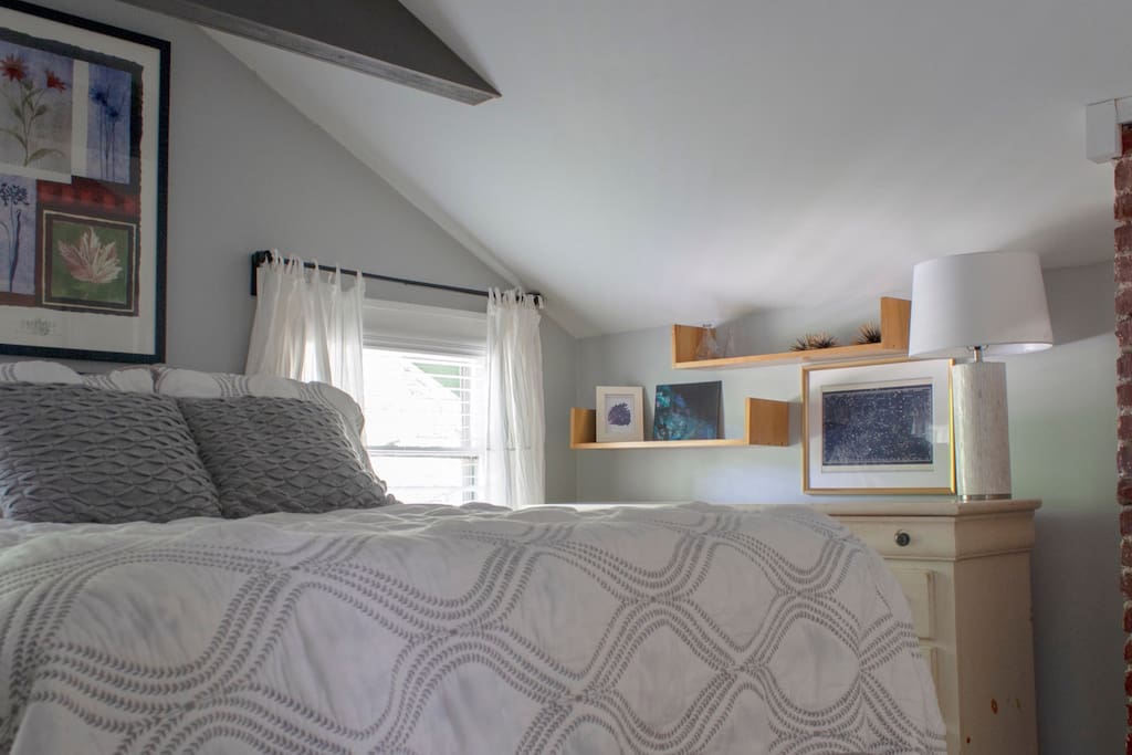 The bedroom can also be bright and airy with a closet, full dresser, and armoire for storage.