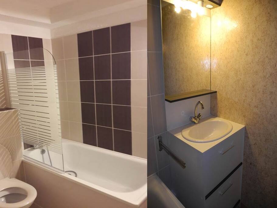 Salle de bain avec baignoire et lavabo + rangements valises
