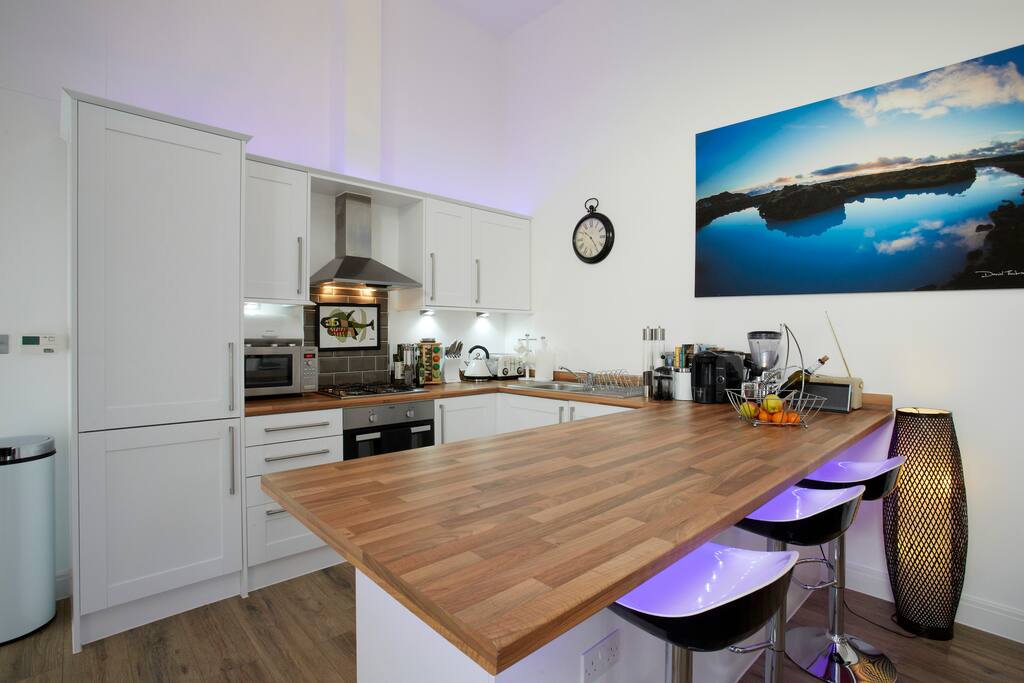 Kitchen with all mod cons and bar area