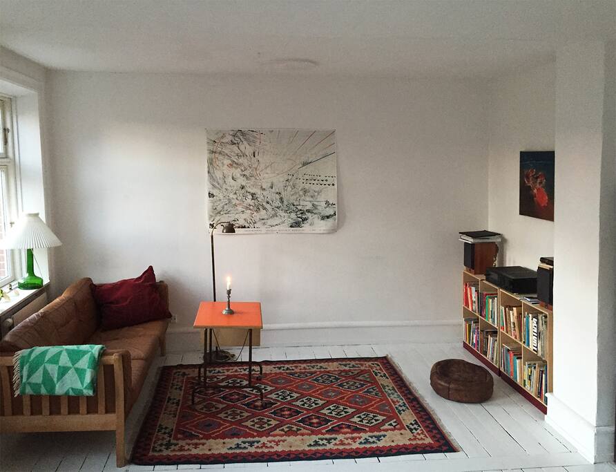 The Living room offers great space for hanging out, relaxing, listening to music. Feel free to read all the books.