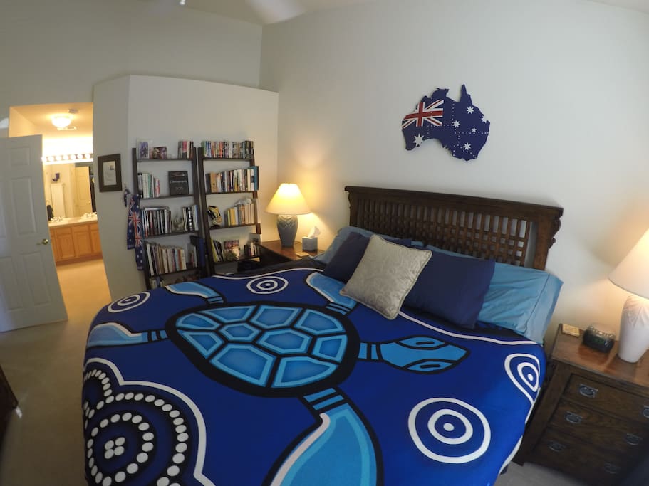 A view of our "Australia Room" Master Suite. Equipped with a luxurious plush-firm-King Sized bed, Flat Screen TV & Blu-Ray/DVD player. Plenty of hanging space in Armoire - Luggage rack provided.