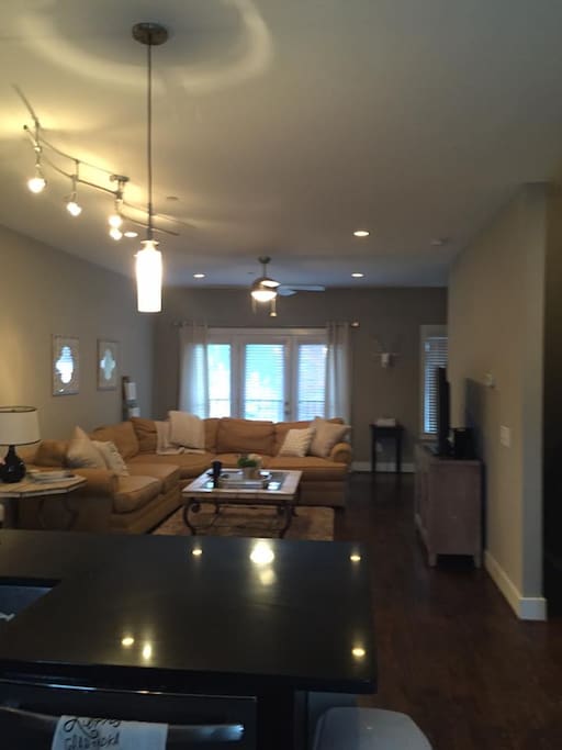 Large living room with lots of natural lighting and tons of seating room!