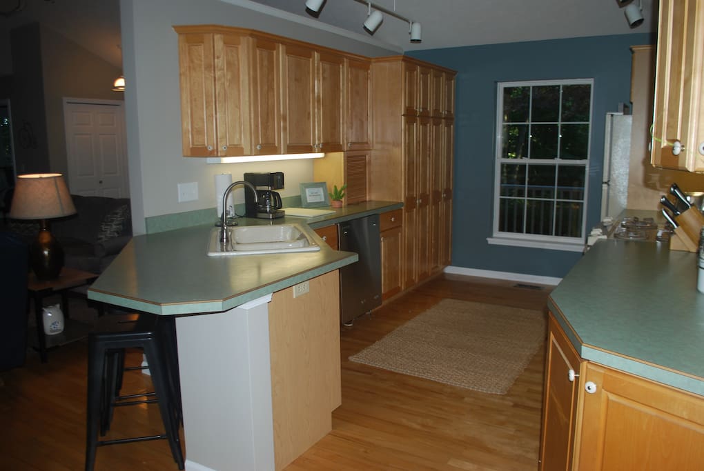 Large Kitchen open to living & dining rooms.