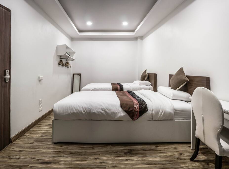 Bedroom #2, two single beds which can add 2 more floor mattresses for totally 4 peoples.