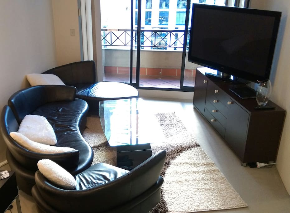 Our living room has a 58inch TV and a sofa/loveseat/chair combination for your viewing pleasure!