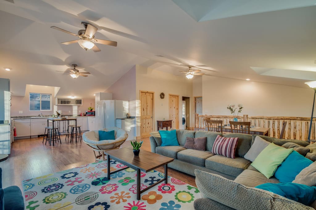 Living and kitchen areas looking towards the bedrooms and laundry area.