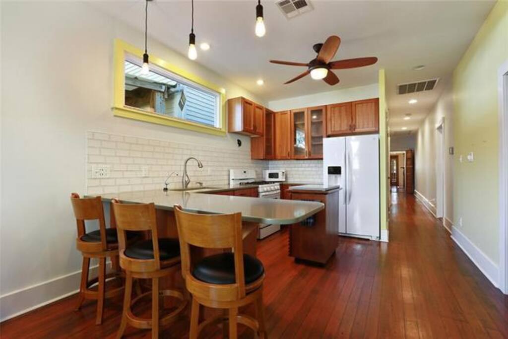 Fully equipped kitchen with peninsula seating.