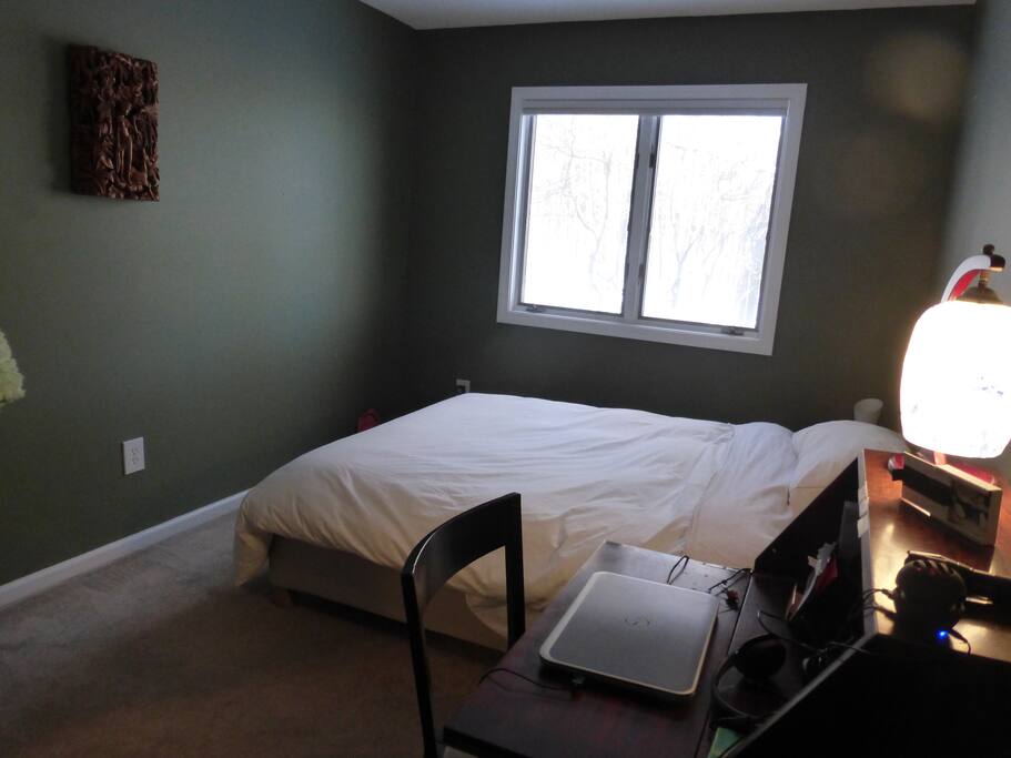 Bedroom has plenty of electrical outlets.