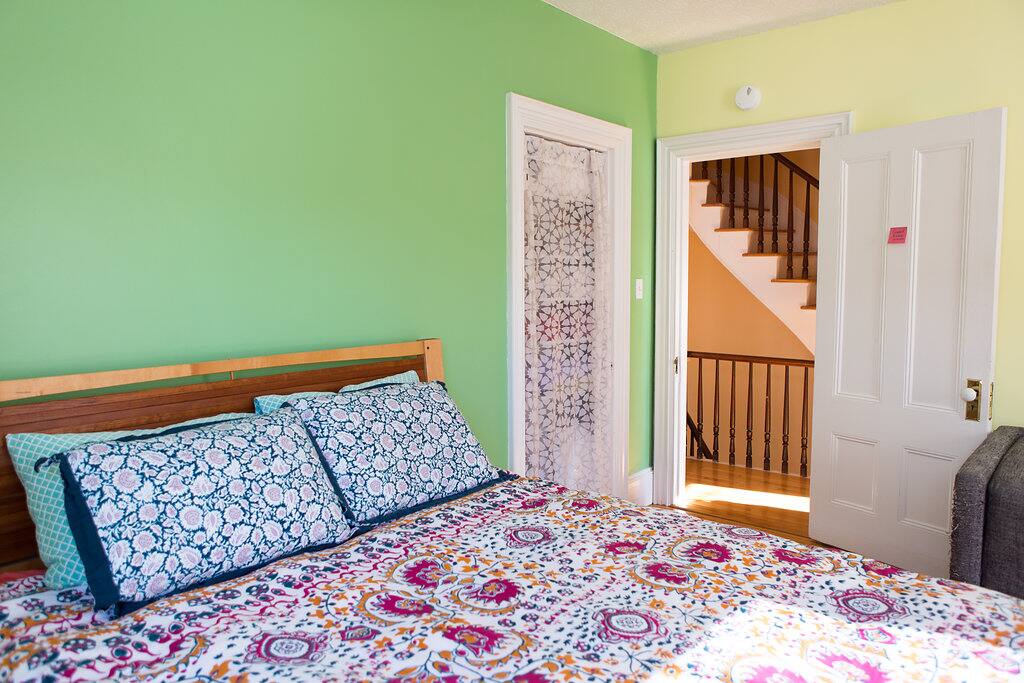 The queen bed was handmade by Marc and features a firm mattress with a comfy pillowtop cover.