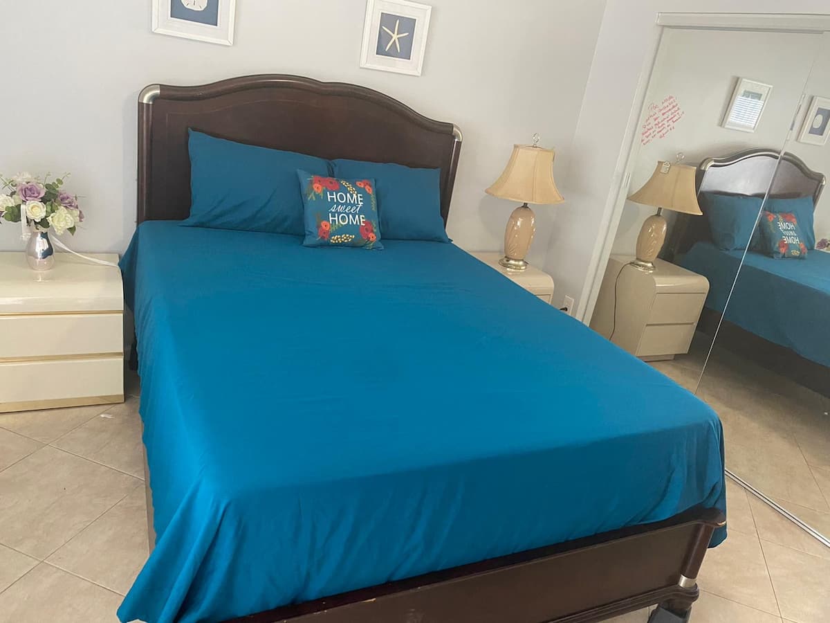 The bedroom at the Palm Suite