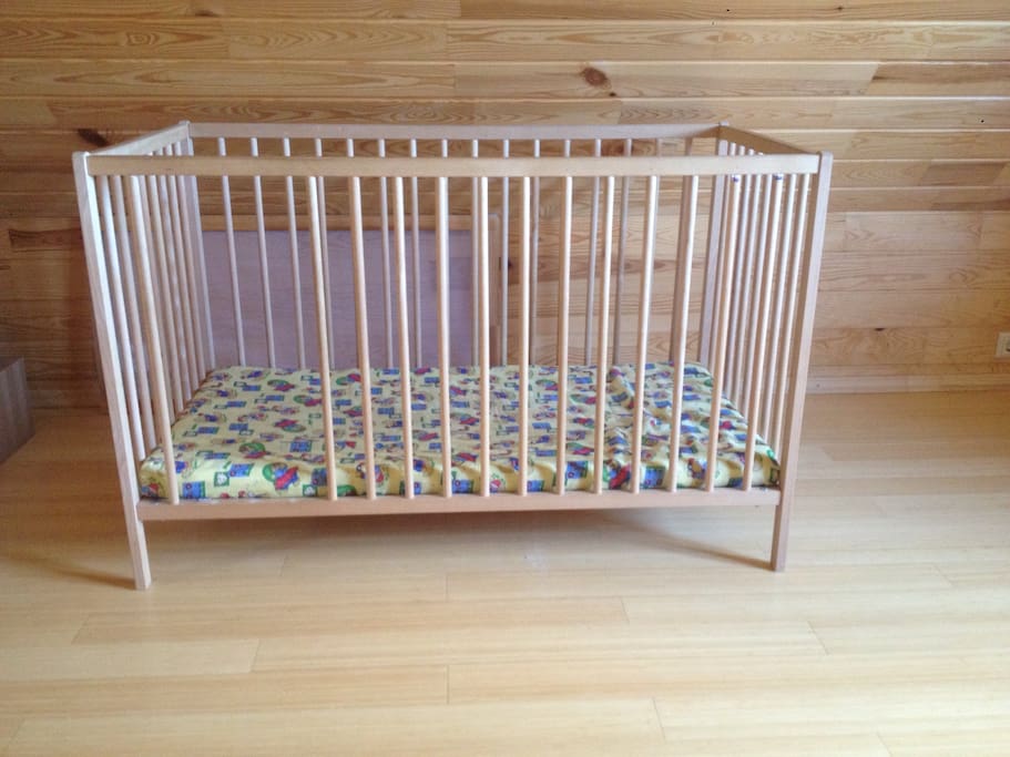 A baby cot for a child up to 3 years old.