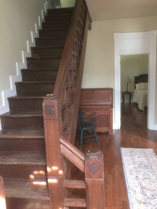 Foyer and stairway to 2nd floor. They don't make them like this anymore.