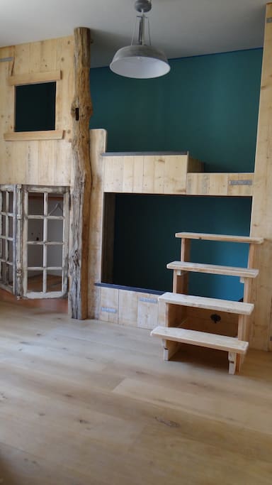 bunk beds in wood with adult size. For 2 persons, children.