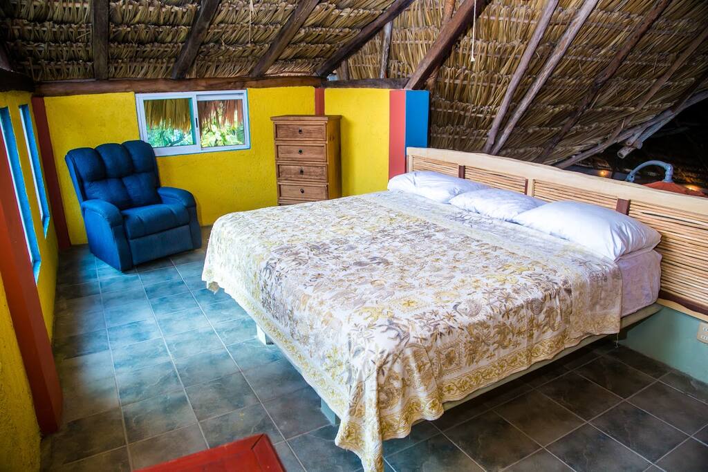 loft in the trees with a king size bed private bath and super sun terrace