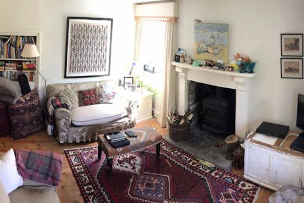 Shared sitting room with wood burning stove, TV, wifi, beautiful views of the garden