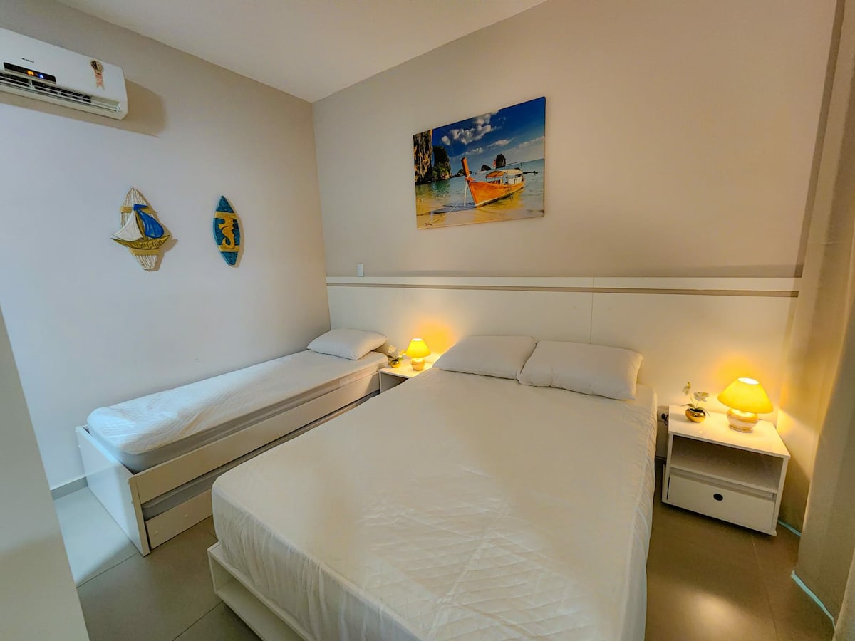 Krevat dopio dhe një bicama e rehatshme.