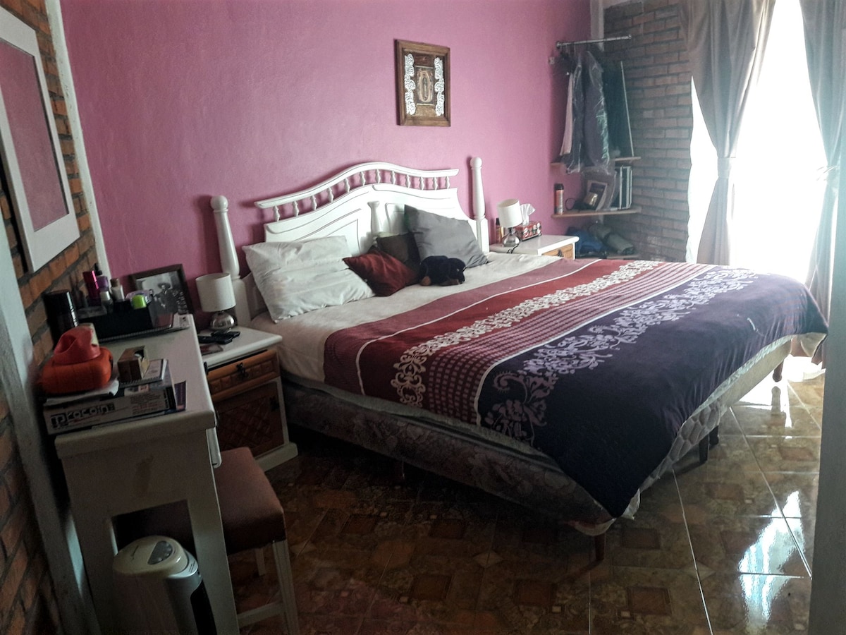 master bedroom with bathroom