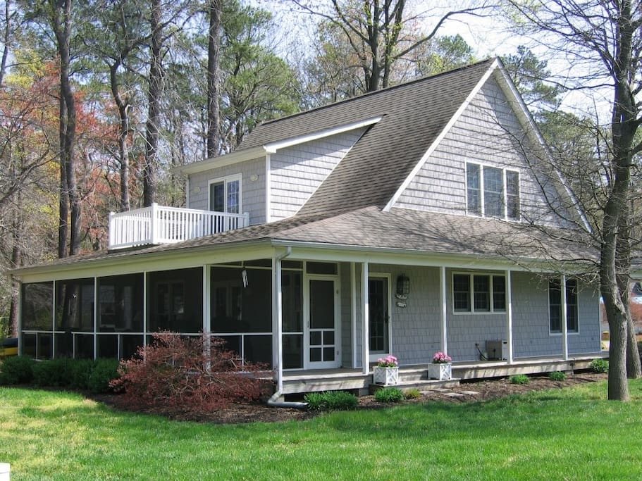 Screened in porch, upper and side decks.