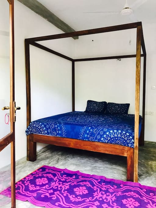King size bed with fancy bedsheets