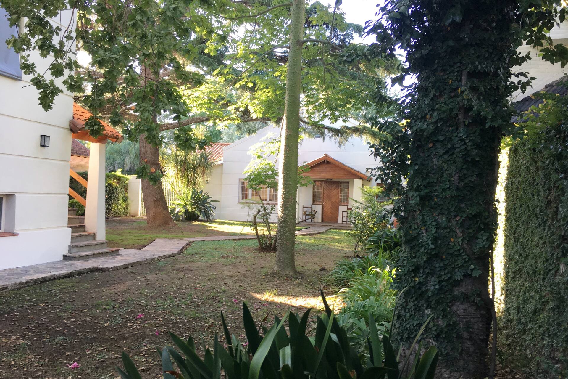 House in the back, garden and pool