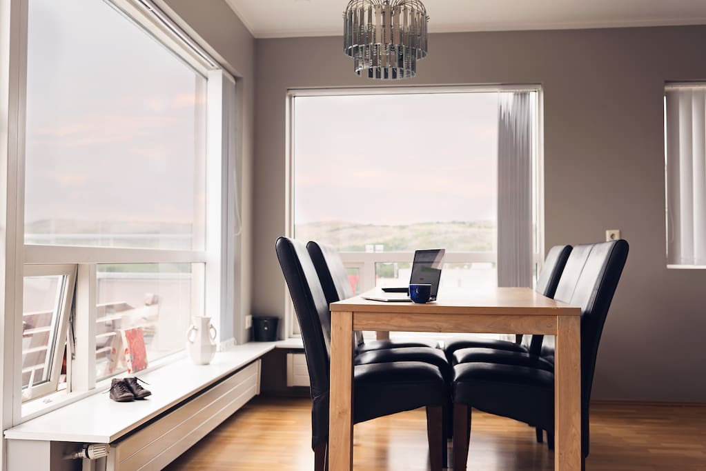 The dining area is bright and has a great view of the surrounding area. Also good to use as a workspace area.
