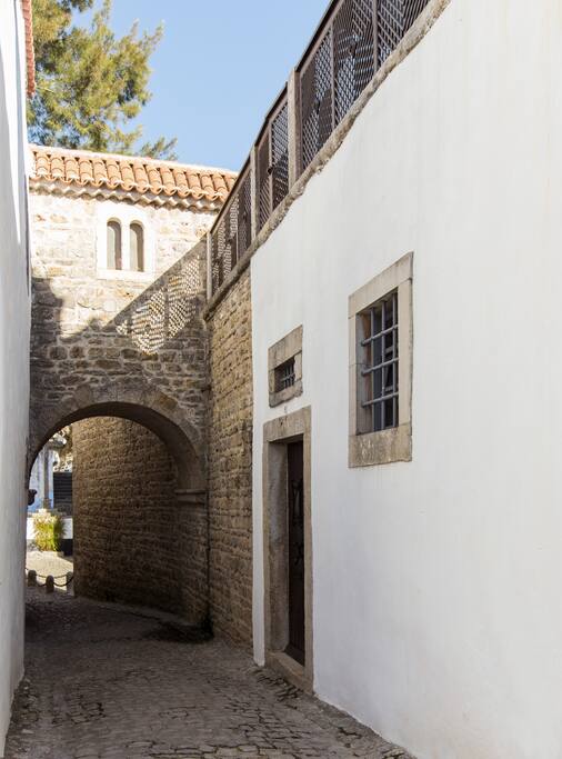 Tower entrance with bridge connection over the street