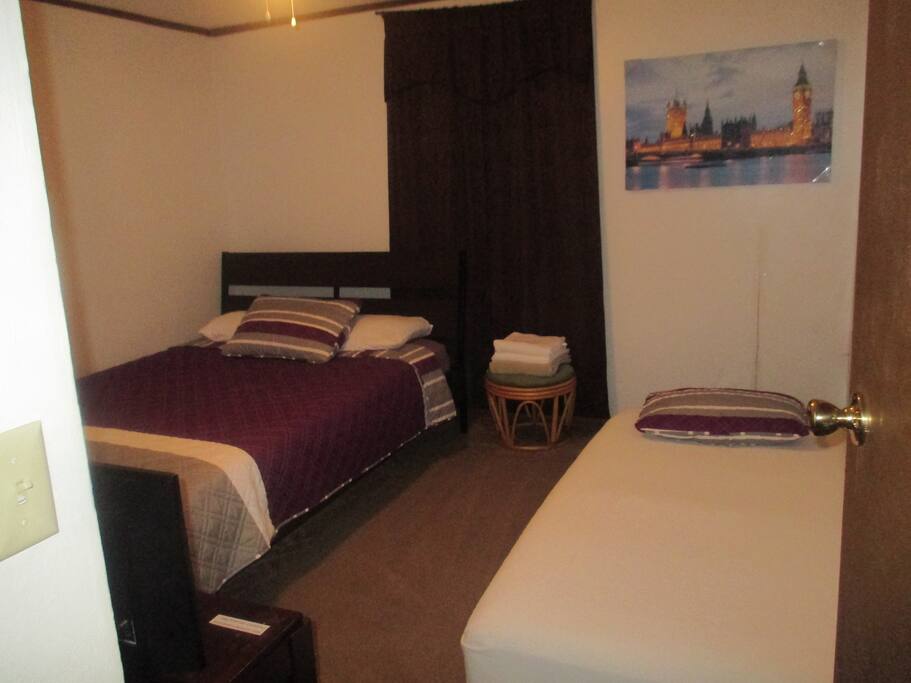 One queen size bed and one twin mattress.