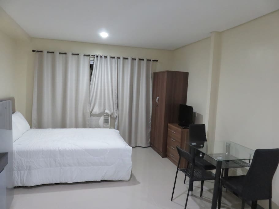 One full size bed with a pull-out. Complete with own closet and dining table.