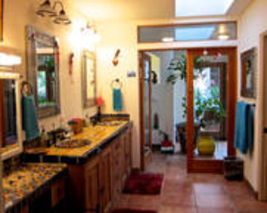 Well lit and expansive bathroom.