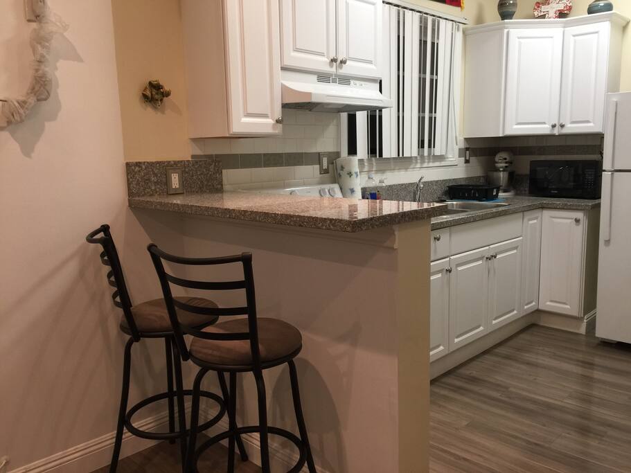 Eat at bar. Full kitchen.