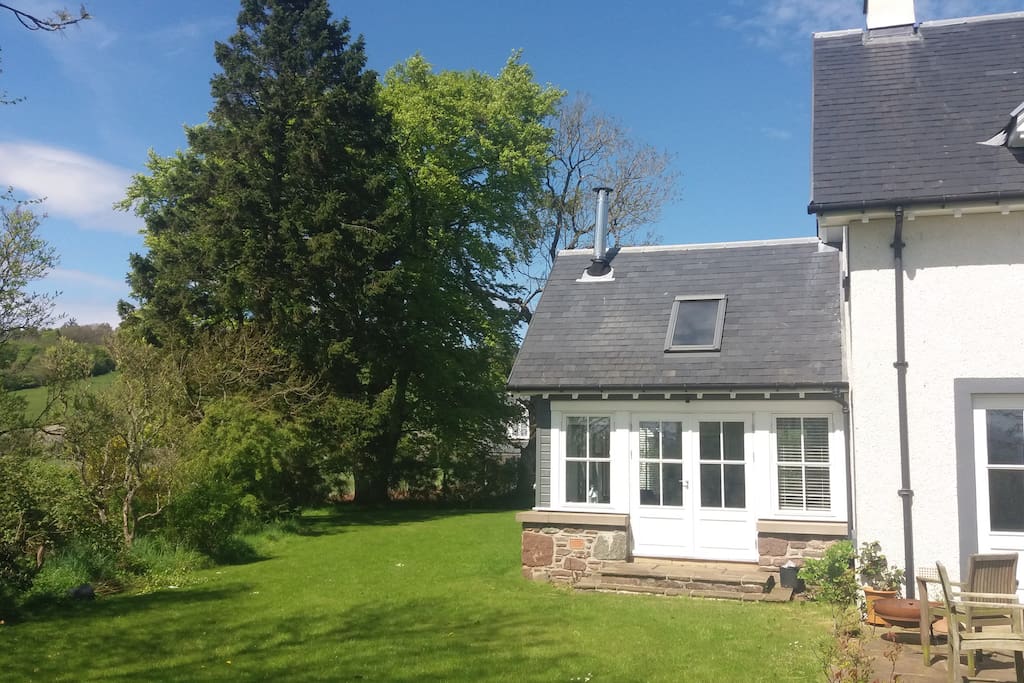 Private garden room with doors onto garden for exclusive use of guests.