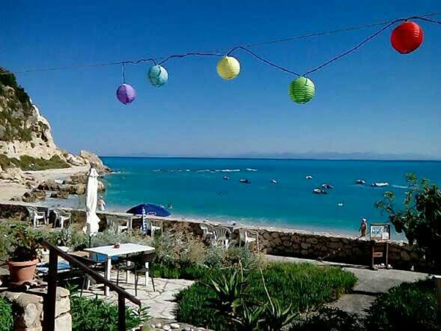 Aspect of Fetsis Apartments, the yard and the beach