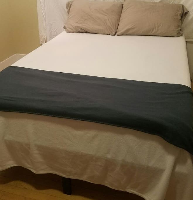 I offer a Brand new "Tuft and Needle"double bed. It is soft, and plush. A small desk, hardwood floors, and oh yeah, the view is amazing.