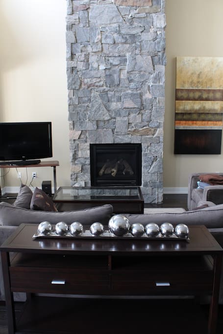 Sitting room - TV, DVD player and gas fireplace.