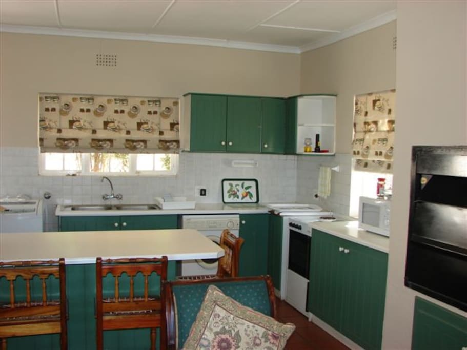 Living room kitchen area with build in braai