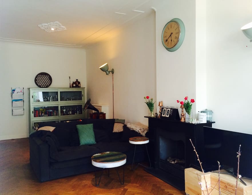 Living area with big coutch, fire on gas and flat TV screen. Make yourself comfortable :-)