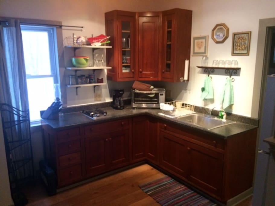 Our hand made solid cherry wood cabinets allow for chefs to create festive meals for their gatherings when they stay on the farm!