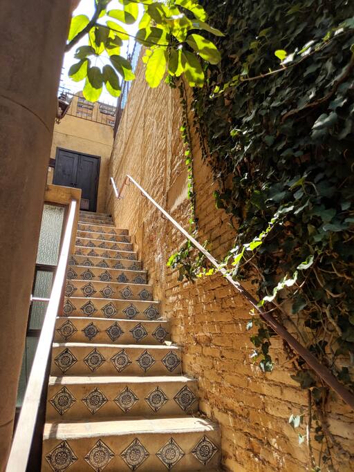 private entrance from street level to patio