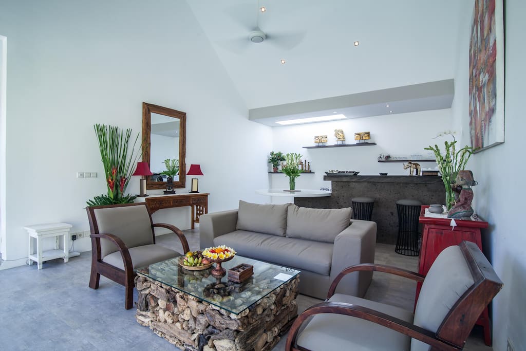 Spacious living room with it's fully equiped kitchen