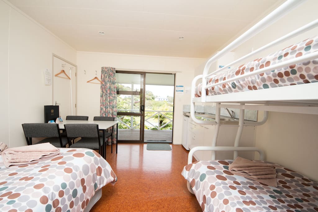 Double bed and single bunk beds.