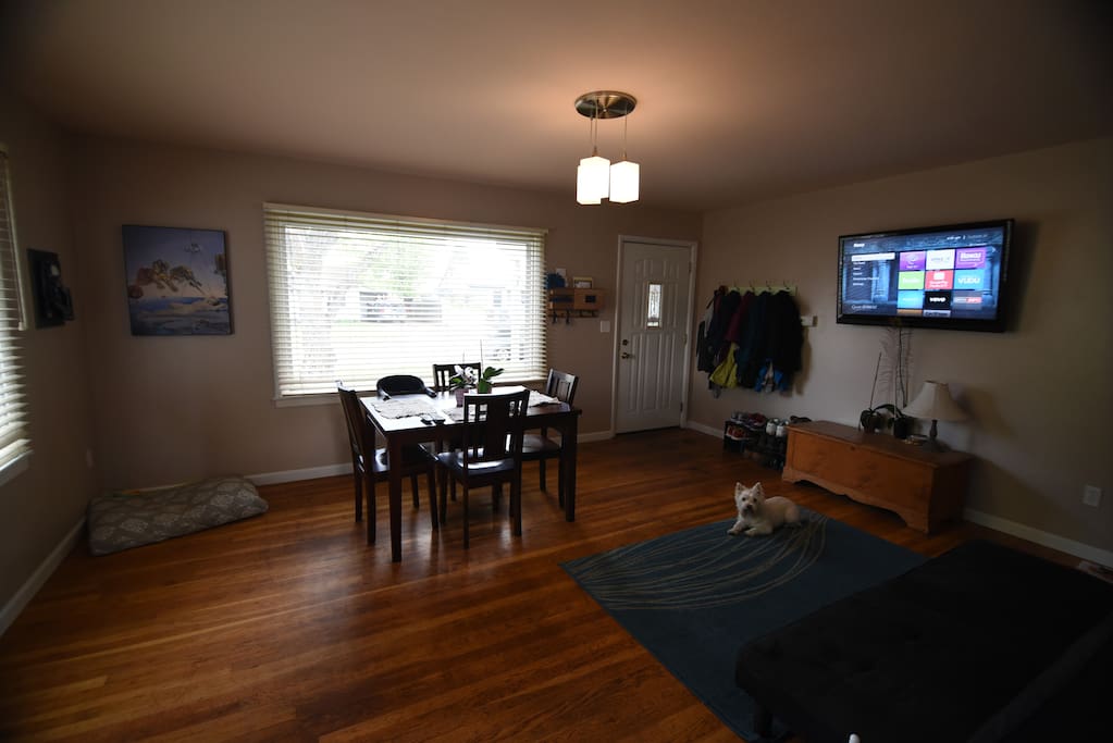 Upstairs, main living room and entry way. There's a futon if you need extra sleeping space.