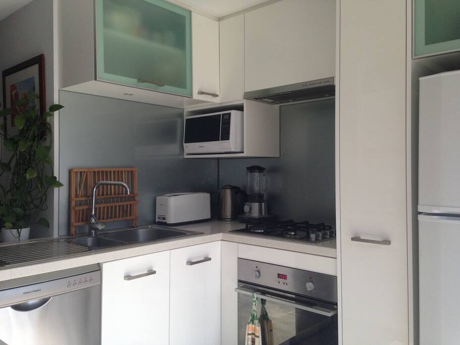 Our kitchen includes microwave, oven and dishwasher.
