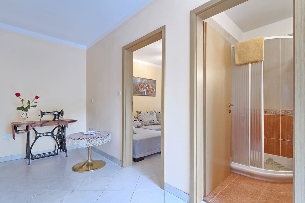 look to living room and bathroom