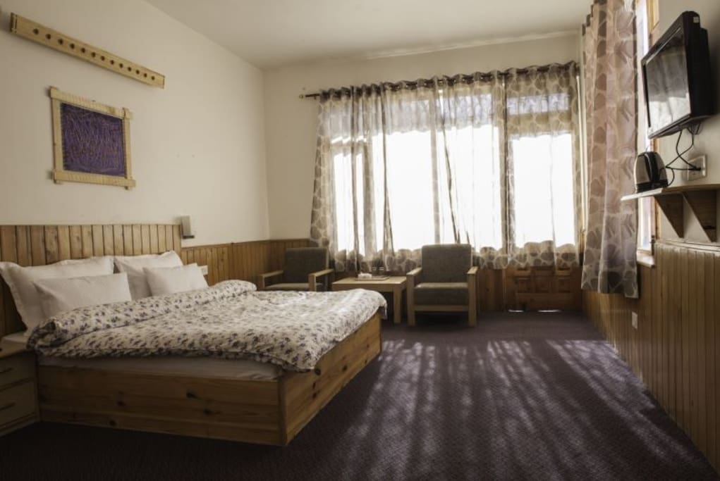Spacious and comfortable private rooms for a good night's sleep.